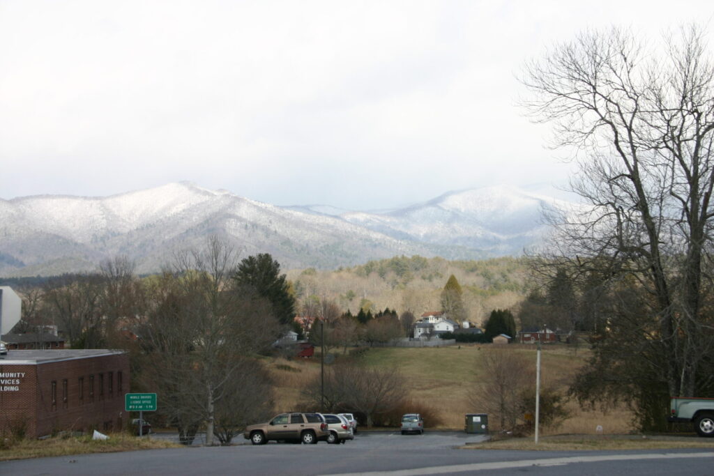 a view of the mountain in a town